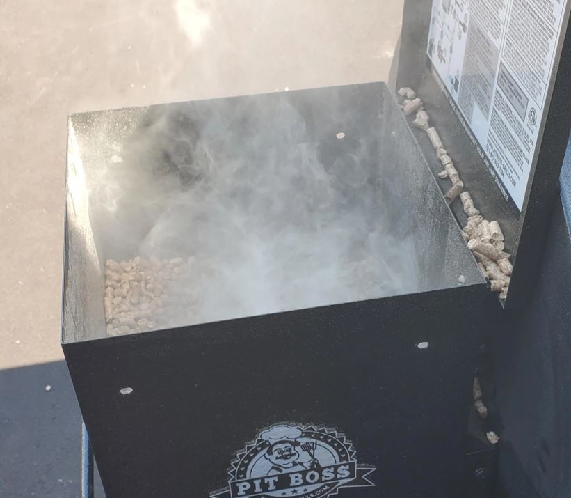 smoke out of hopper of pit boss pellet grill